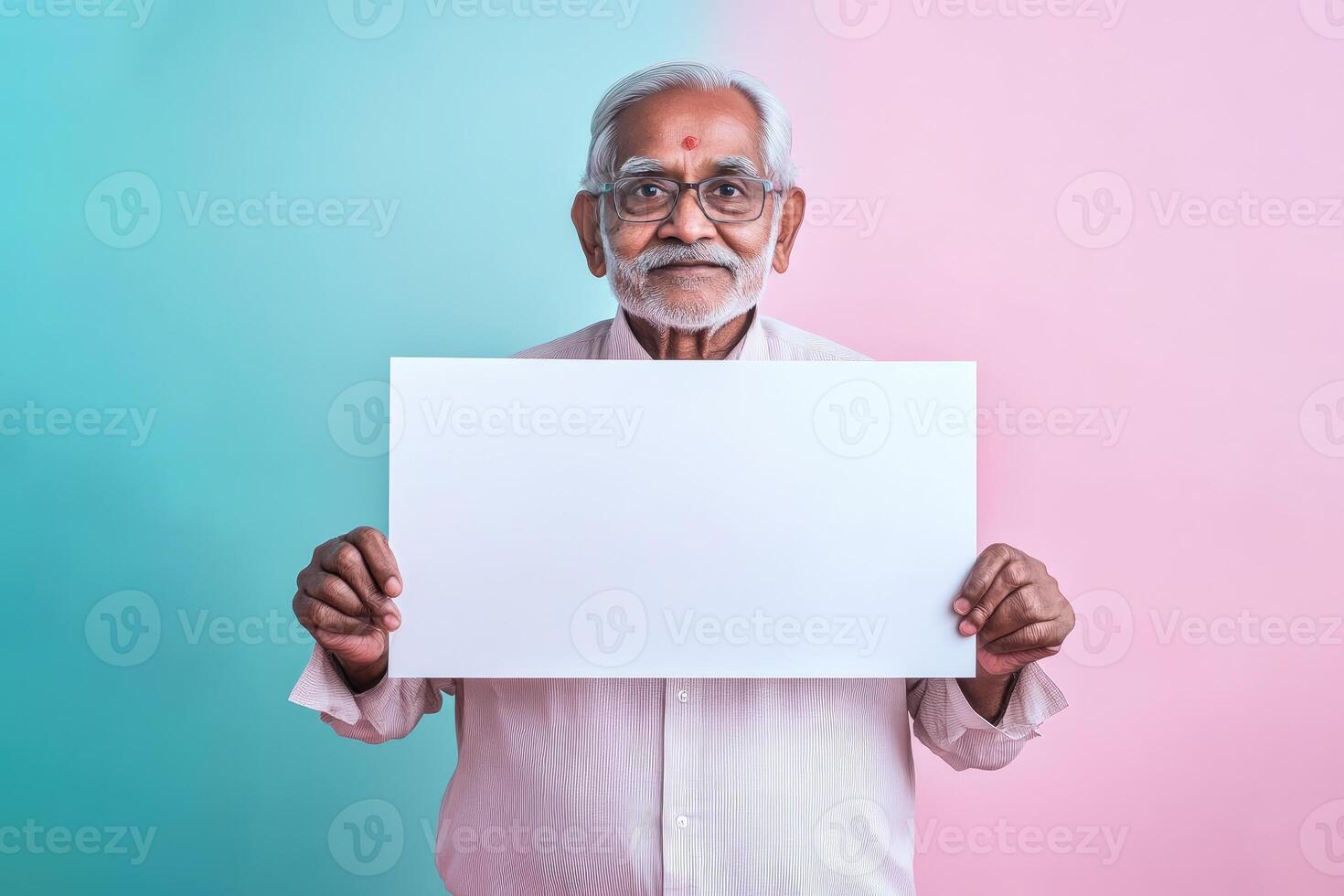 Elderly Man Holding Blank White Sign Pastel Background photo