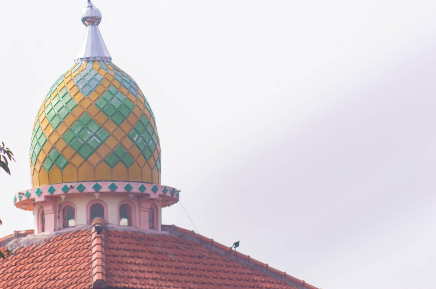view of the mosque dome with a checkered pattern and bright colors photo