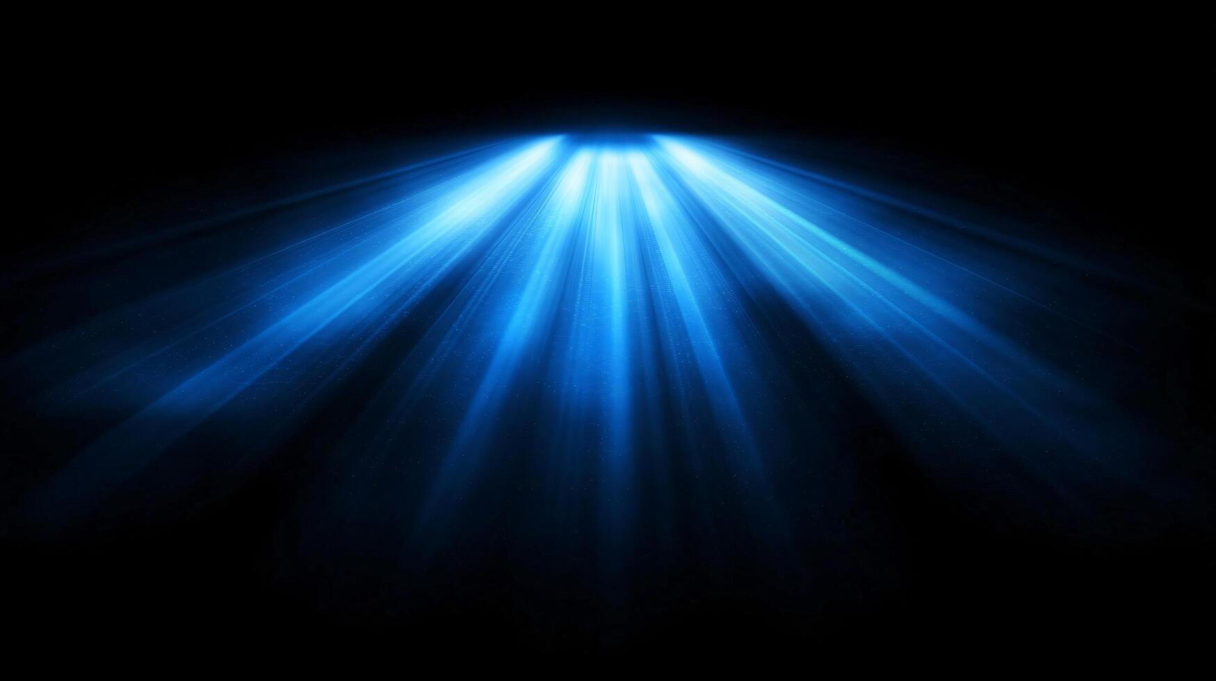 Blue light beams radiating from a central source. photo