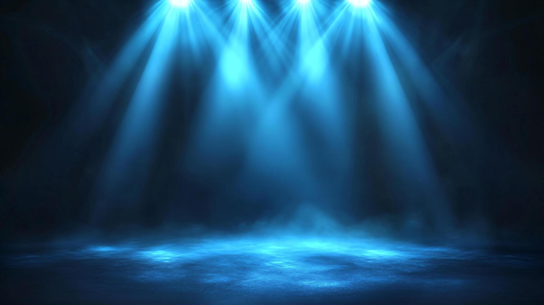 Soft blue spotlight beams illuminating empty stage photo