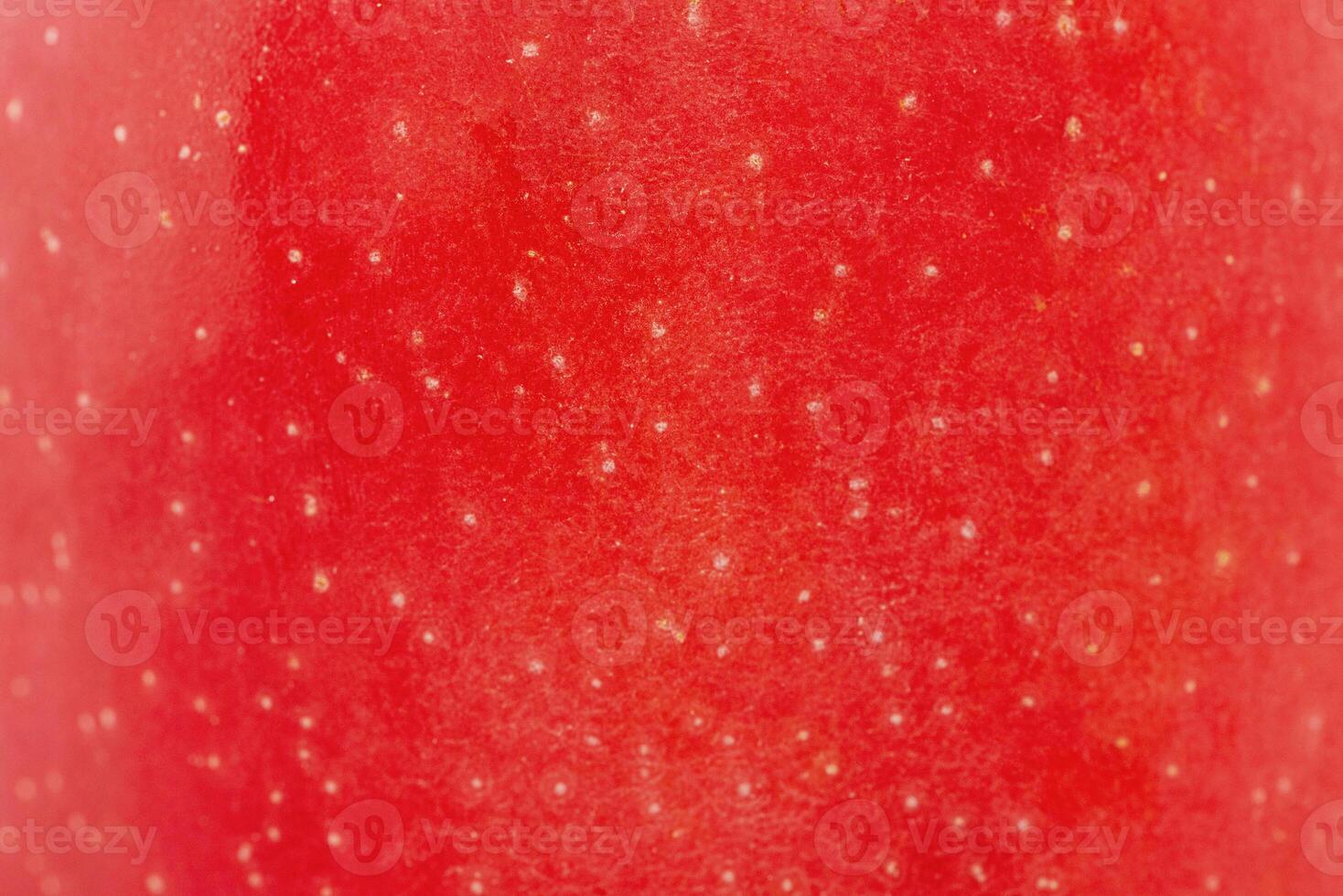 Texture of a red apple as a background macro photo. photo
