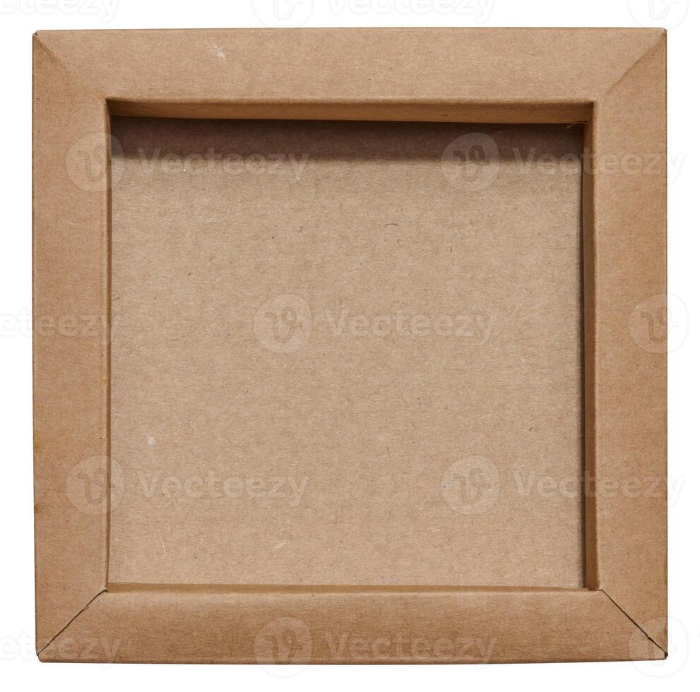 Empty brown square cardboard box on isolated background, top view photo