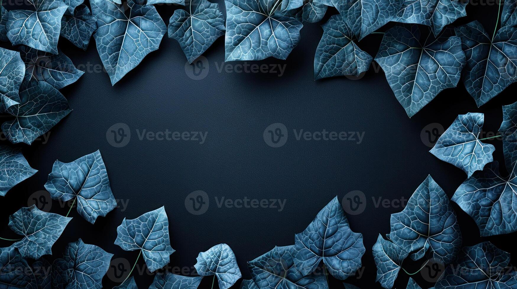 Deep blue ivy leaves create a captivating border around a dark void photo