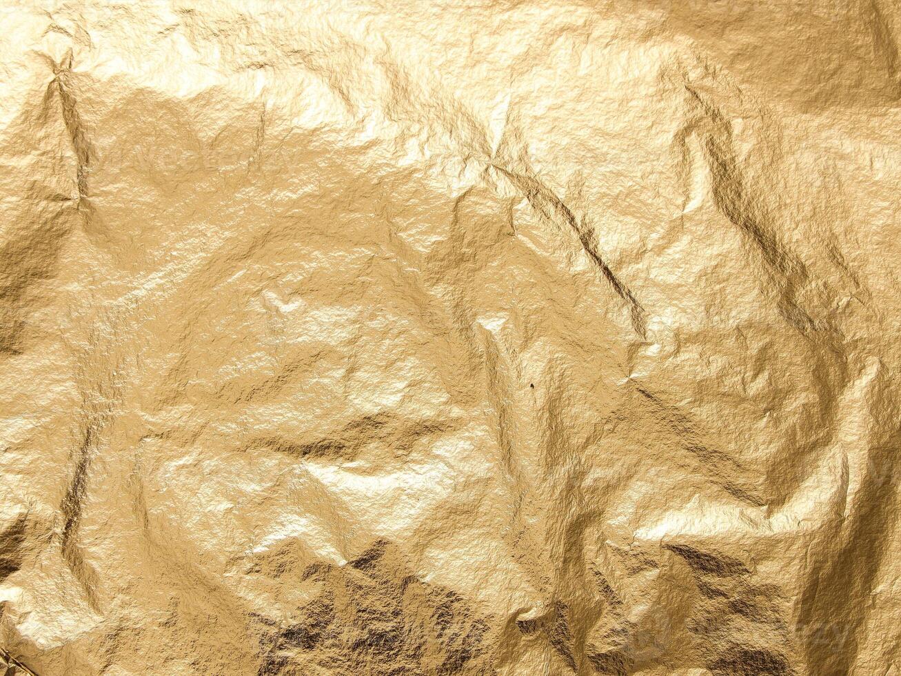 a close up of a gold crumpled paper photo