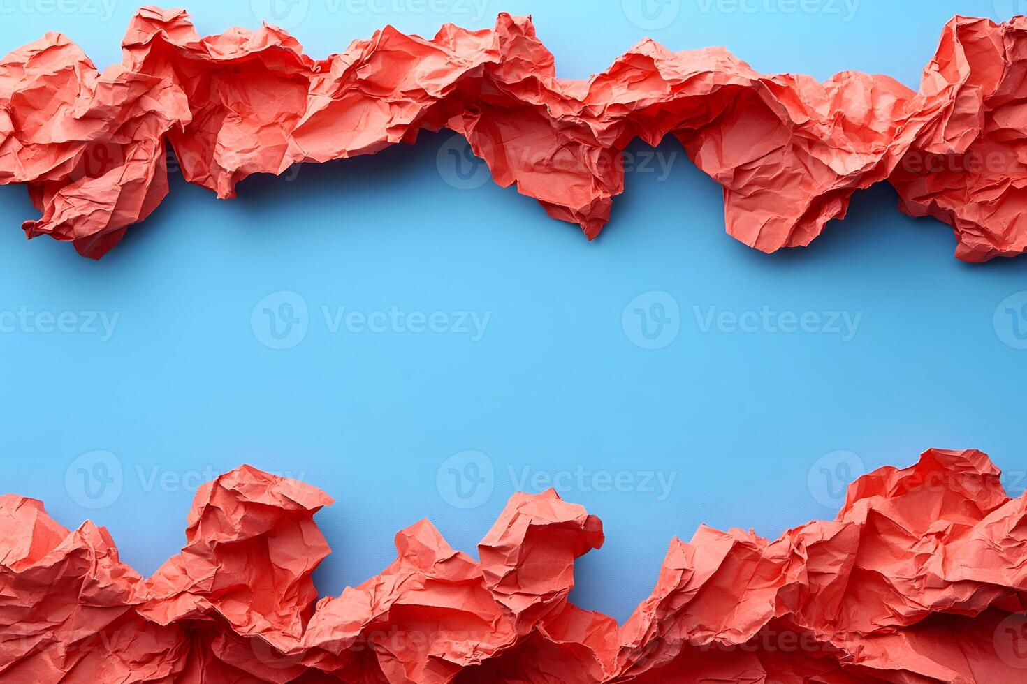 Abstract Composition of Red Crumpled Paper Against Blue Background for Design and Creativity photo