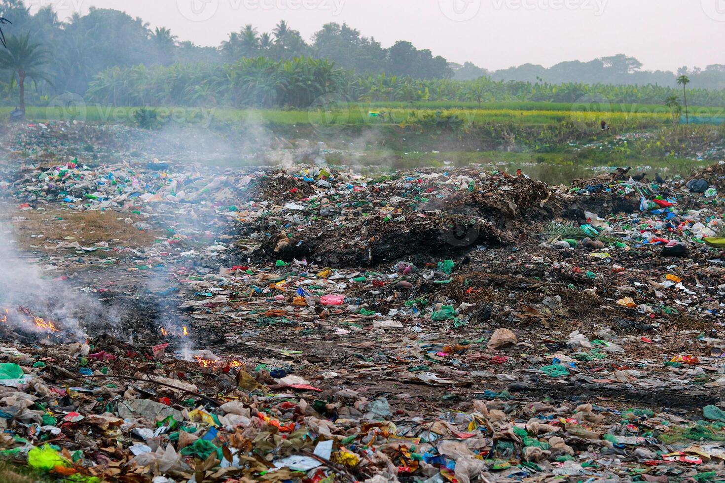Pile of garbage in the countryside. Pollution of environment concept. photo