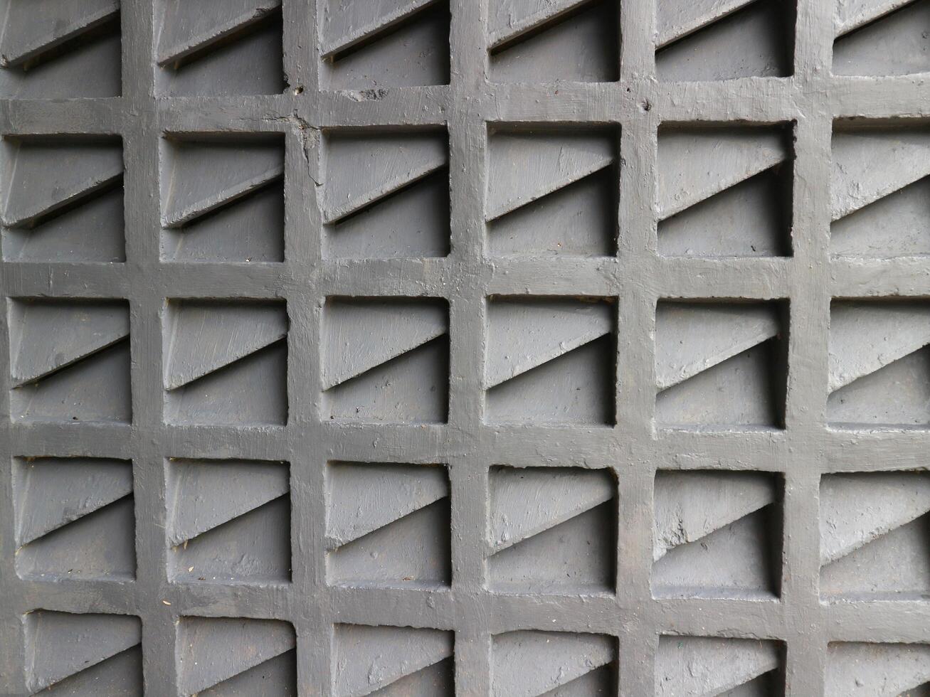 the shape of a wall in a building with a geometric design photo