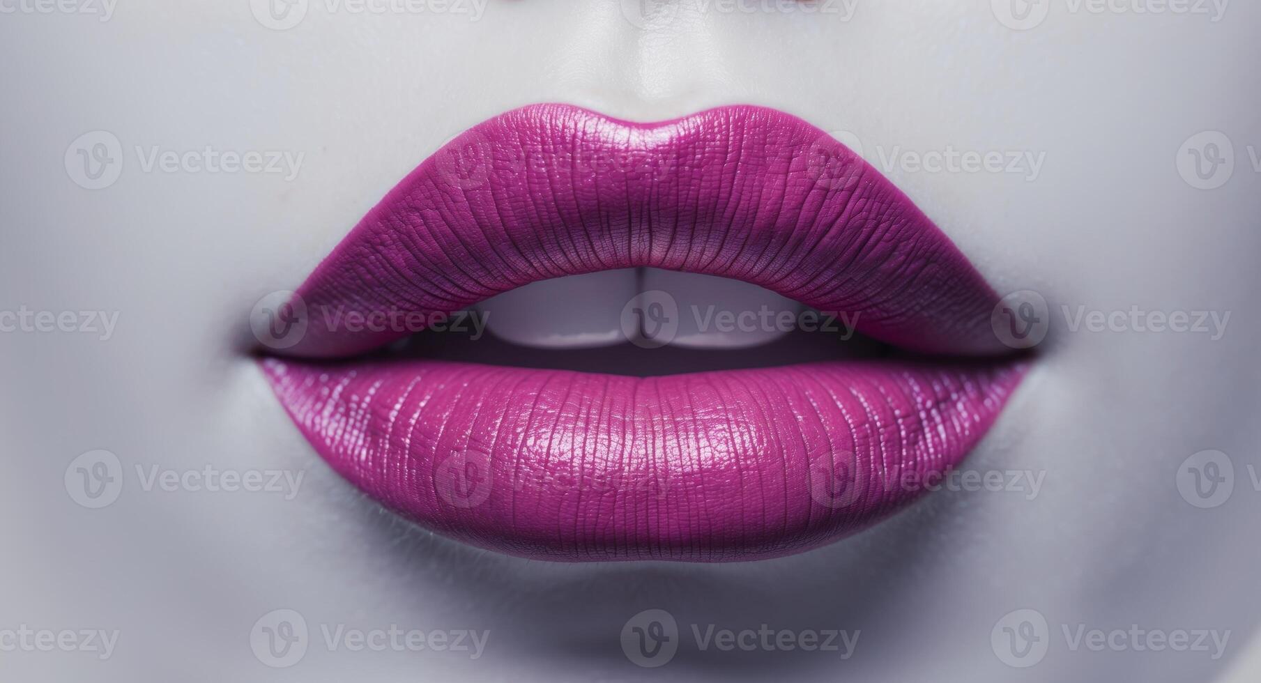 Glossy lips with vibrant lipstick in studio lighting close up photo