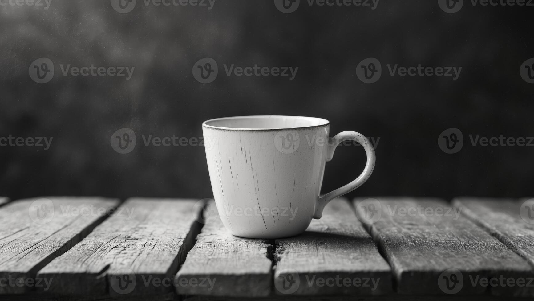 Coffee Cup on a Rustic Wooden Table with Dark Textured Background and Soft Focus Lighting Effects photo