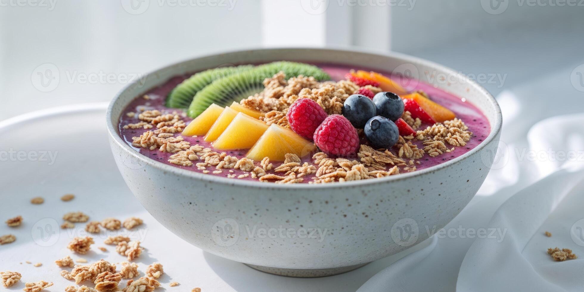 Artfully Arranged Smoothie Bowl with Fresh Fruits and Granola photo