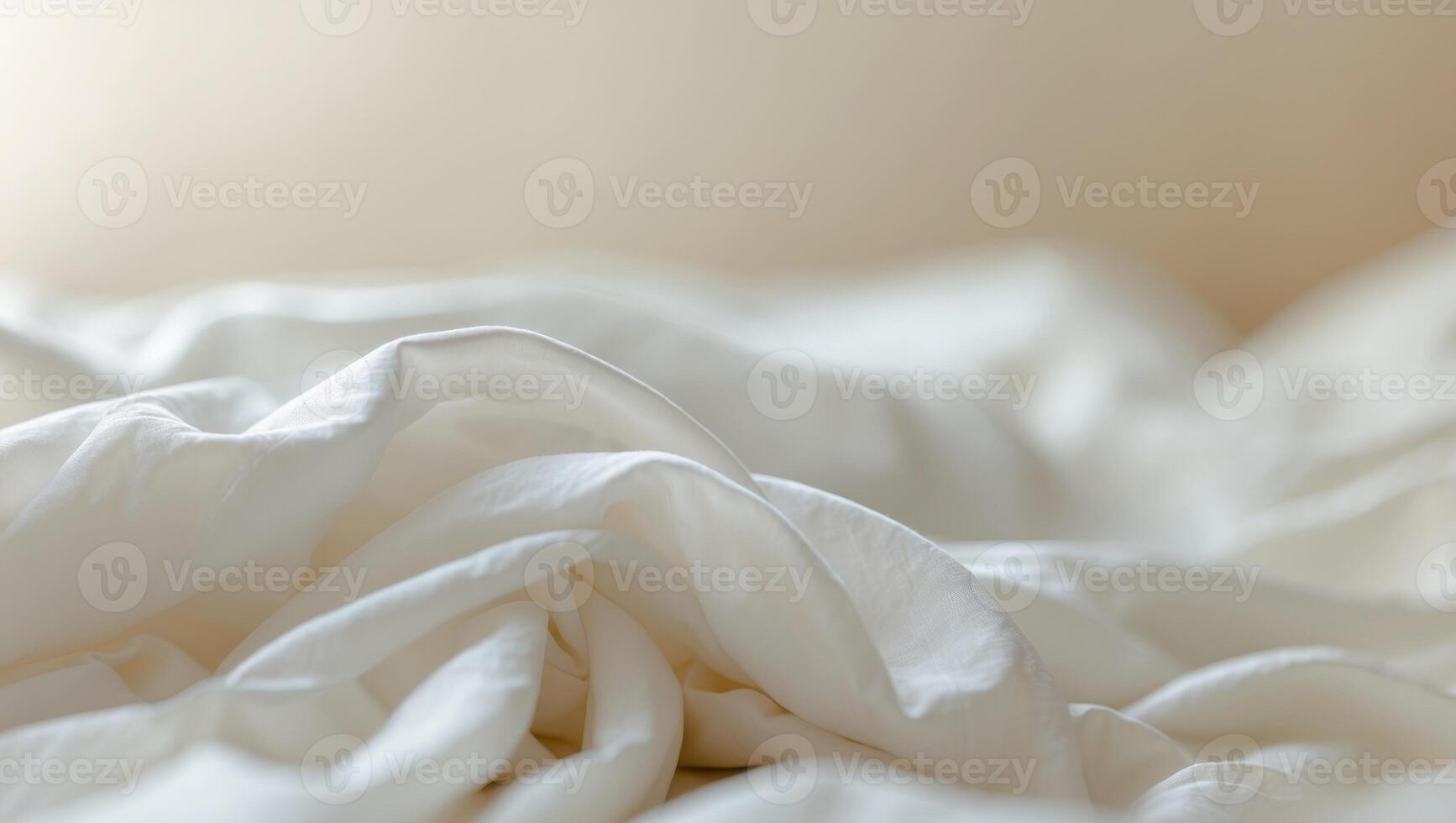 close up of white bedding sheets soft focus and copy space photo