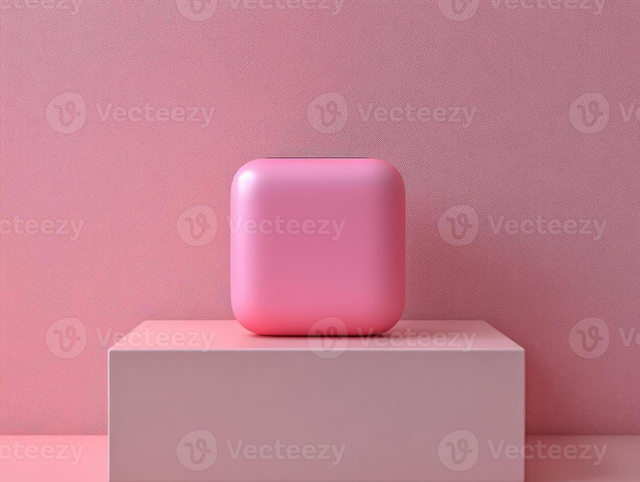 A smooth, pink cube-shaped object displayed on a pedestal against a pink background. photo