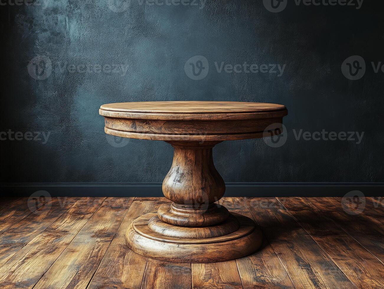 A rustic wooden table with a round top, set against a dark wall and wooden floor. photo