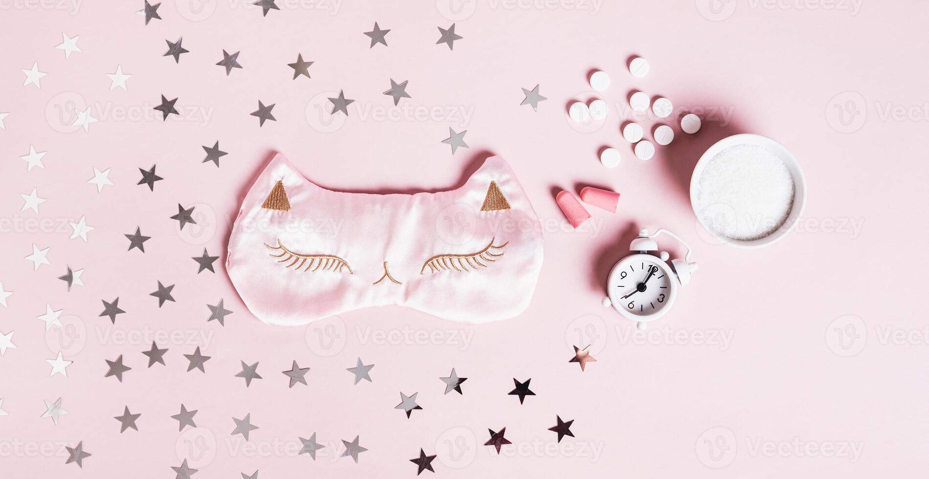Concept good sleep, magnesium powder, sleep mask, alarm clock and earplugs on pink web banner photo
