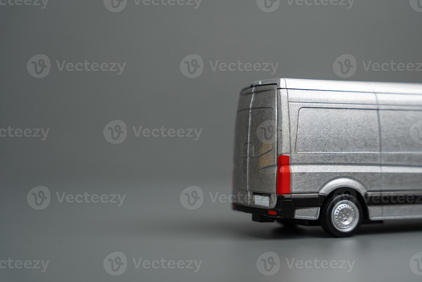 The back of a departing goods delivery and logistics van and copy space. Delivery and other services in the city. photo