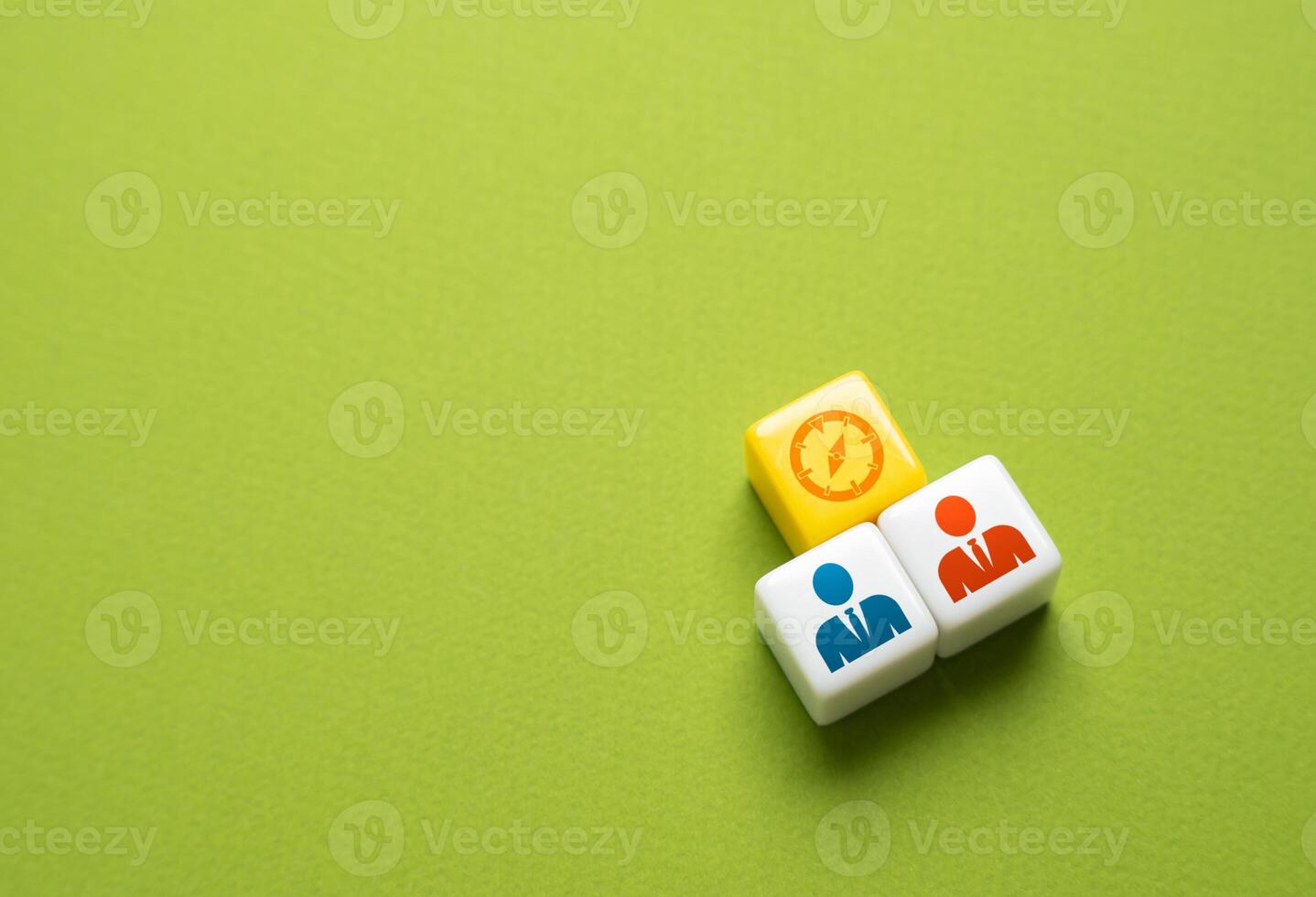 Two business partners are guided by a compass in the direction of their future work. The concept of cooperation and collaboration. Develop a strategy and divide responsibilities. photo