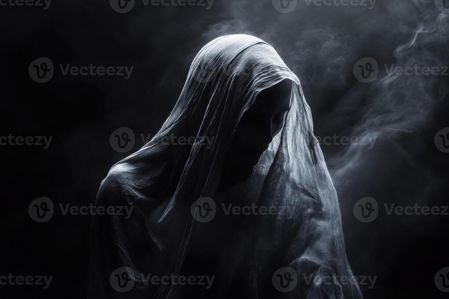 Mysterious figure in a veil surrounded by swirling smoke at night photo
