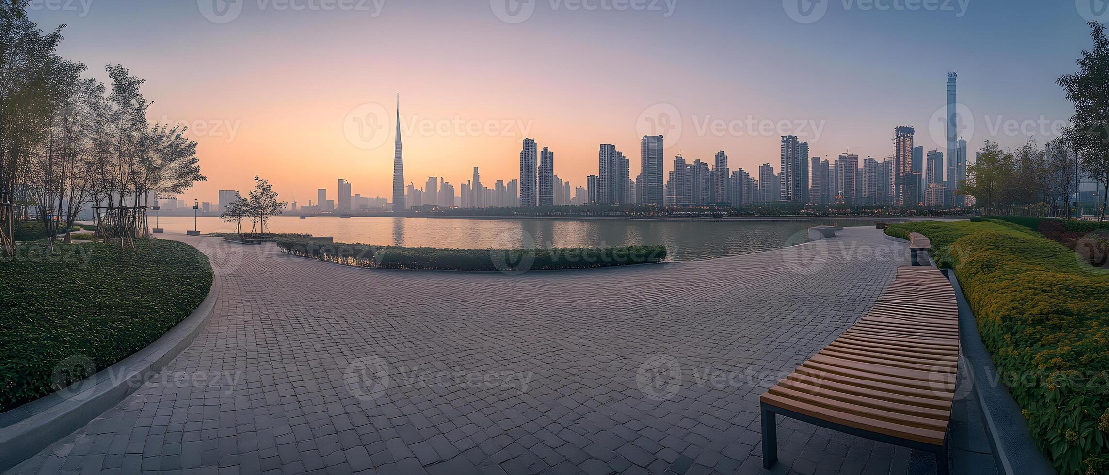 Cityscape Skyline at Sunset with Park and Bench photo
