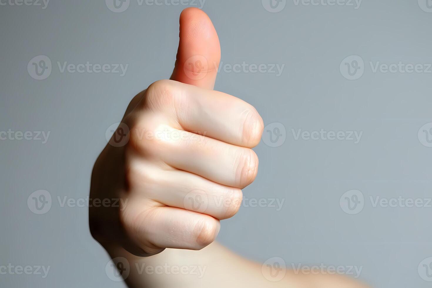 Hand Signals. Thumbs Up Gesture, a Positive Nonverbal Communication, Showing Approval and Agreement Universally, Demonstrating Consent and Satisfaction Enthusiastically. photo