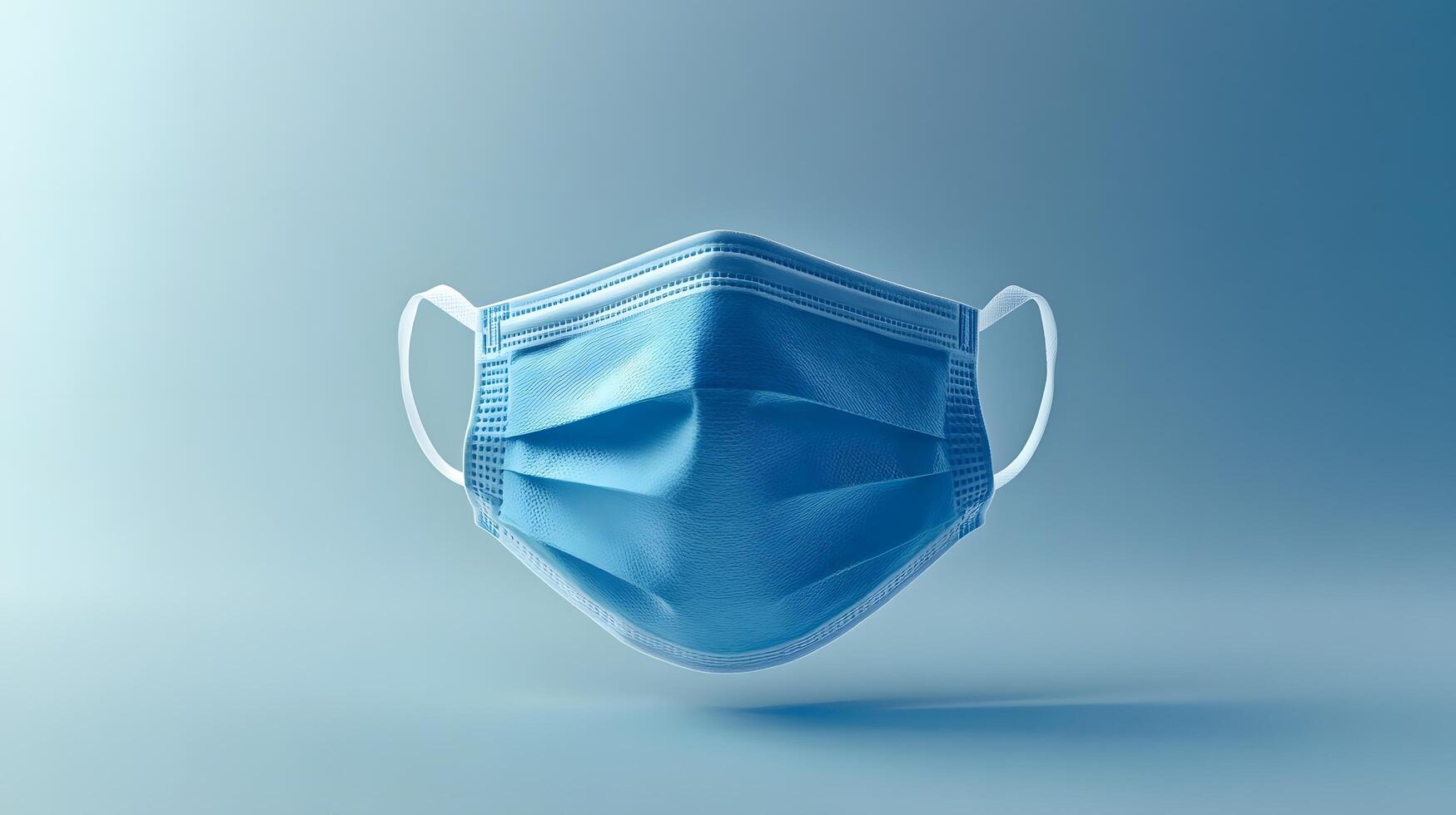 Simple blue surgical mask illustration floats against pure white background. Clean design emphasizes medical protection with subtle shadow beneath disposable face covering. necessary photo