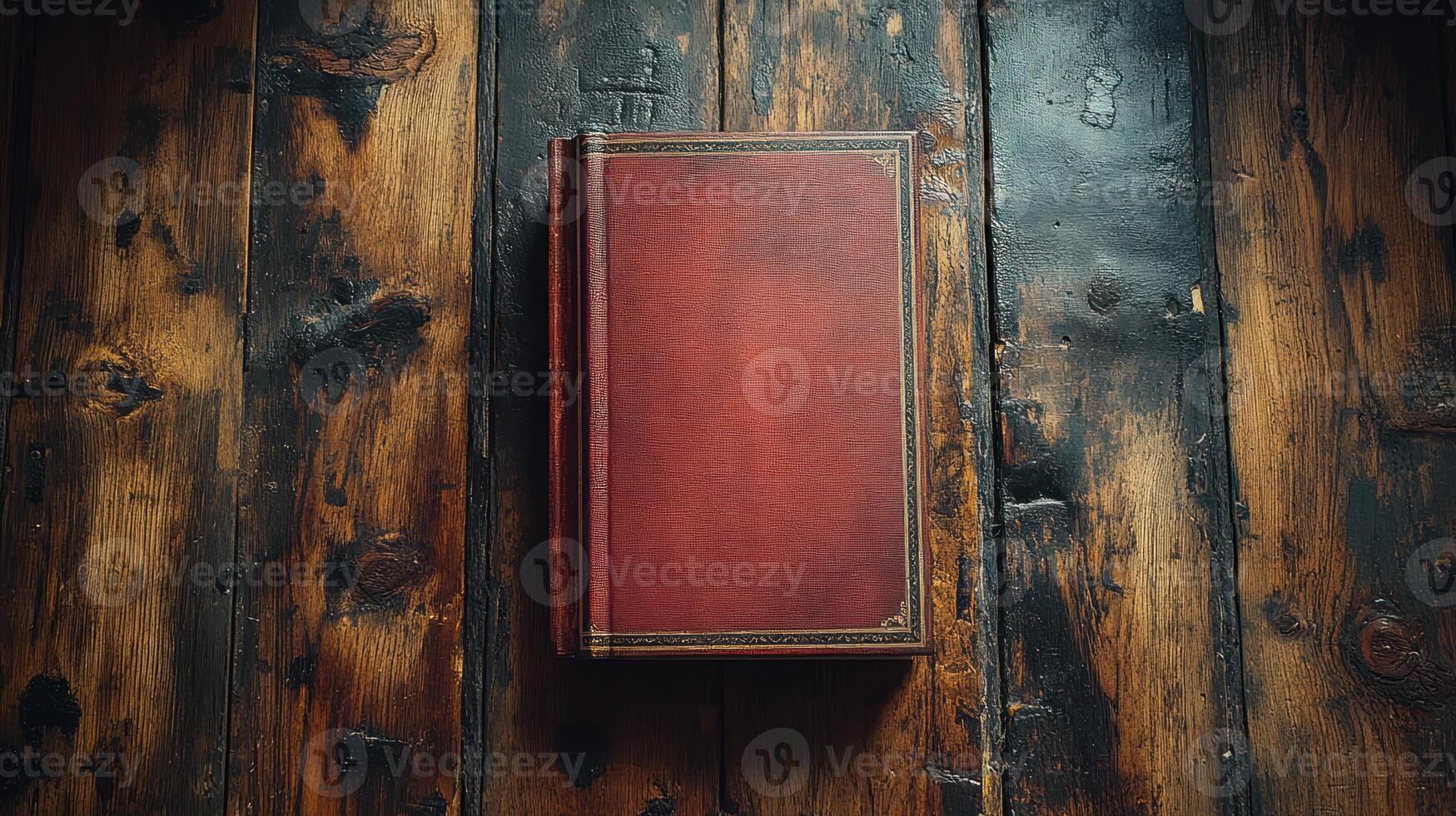 A red-bound book lies on aged wooden planks, inviting readers to explore photo