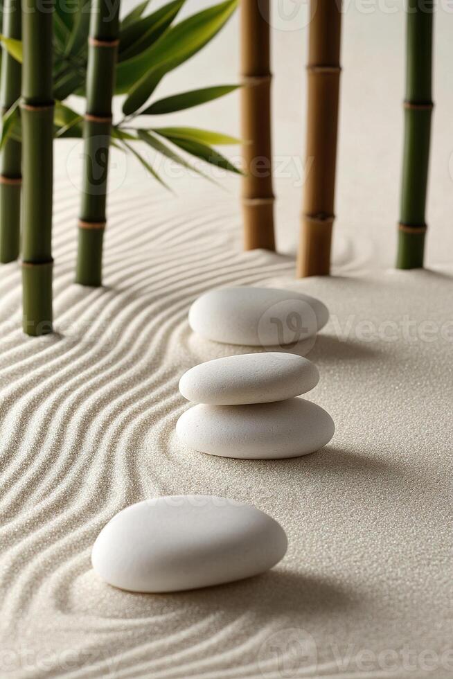 Create serenity and focus in design with a calming minimalist zen garden featuring smooth white stones and bamboo stalks for a harmonious backdrop photo