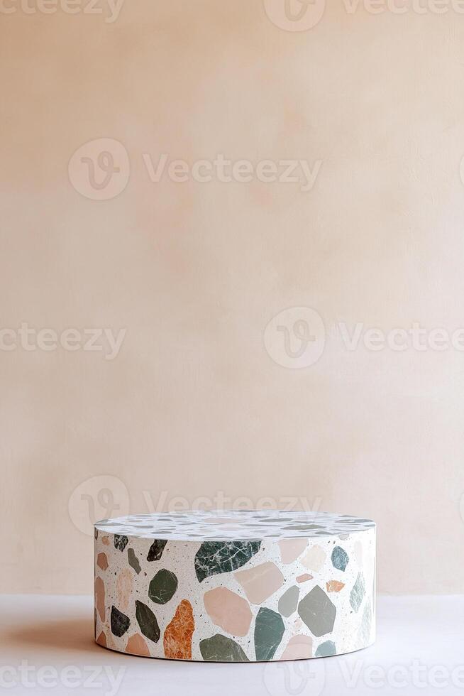Modern terrazzo podium featuring pastel stone chips against a soft neutral backdrop ideal for presentations and displays photo