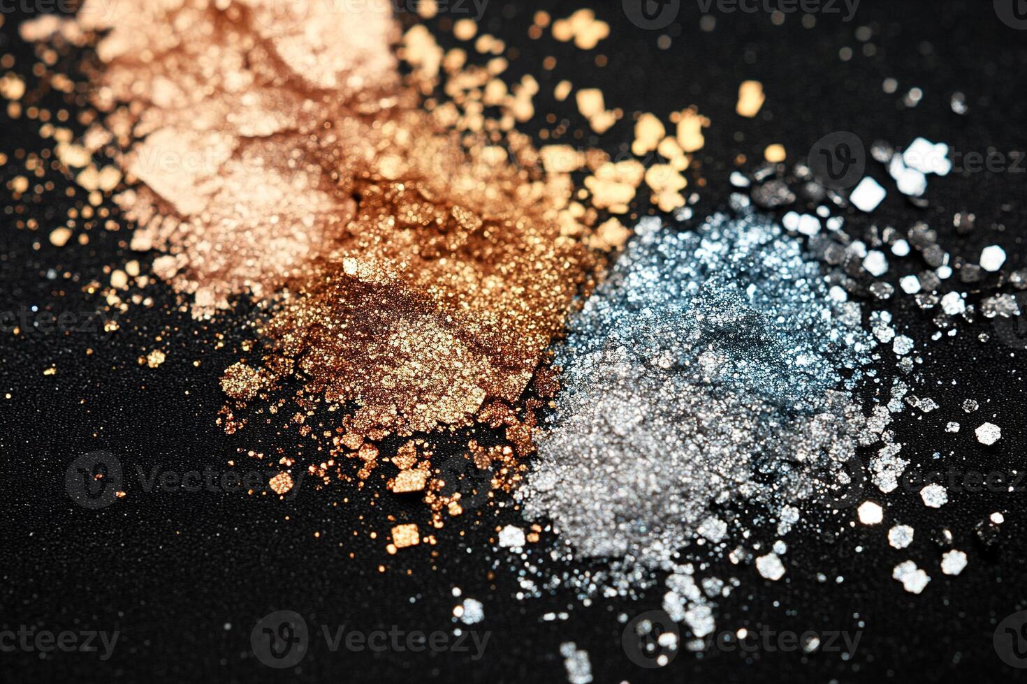 Luxurious abstract makeup texture showcases fine glitter powder in shimmering gold and silver tones against a matte black velvet background, offering bold elegance and ample space for text overlay photo