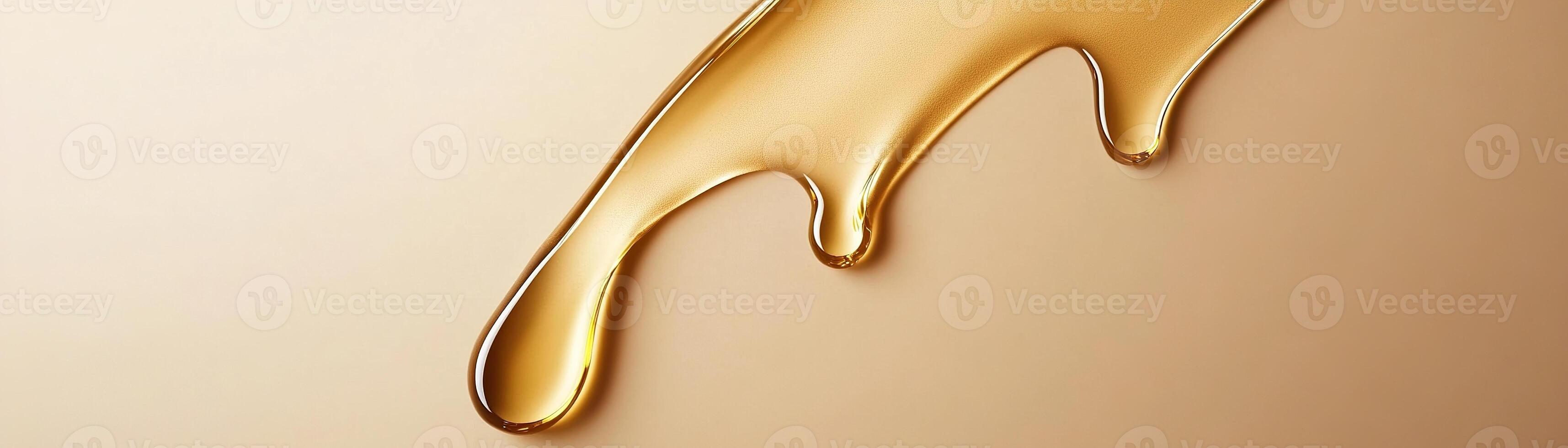 Luxurious golden oil drips gracefully on a matte beige surface, creating a serene and modern backdrop for cosmetic branding and beauty products photo