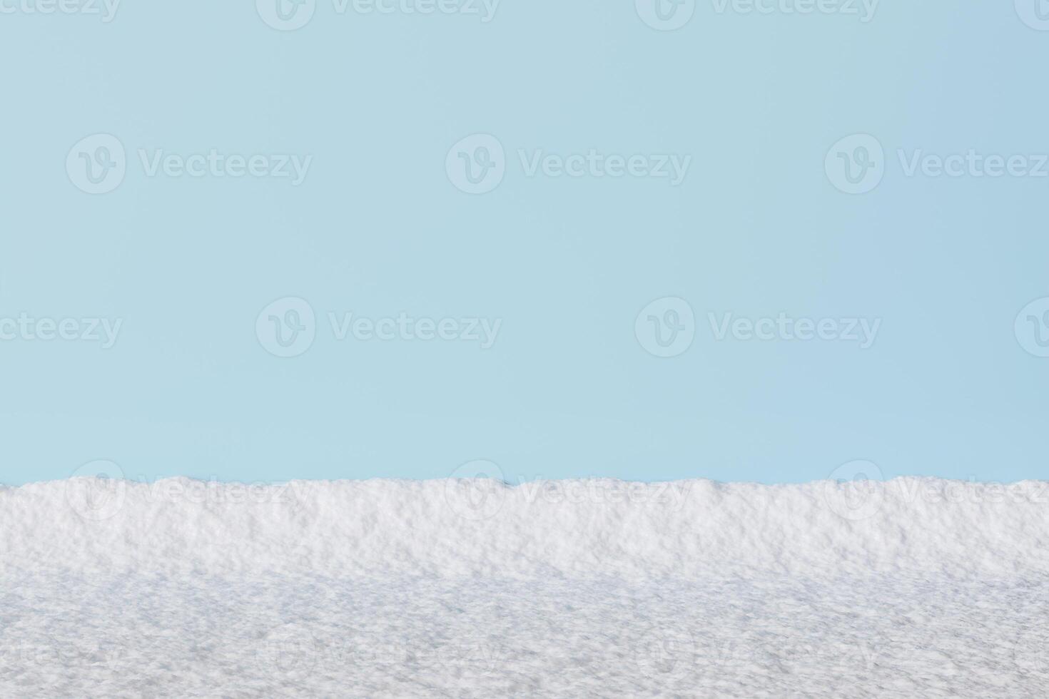 Clean snowy foreground with a bright blue sky backdrop. Minimalistic winter landscape perfect for seasonal designs, holiday themes, or serene natural compositions. Copy space for text. 3D rendering. photo