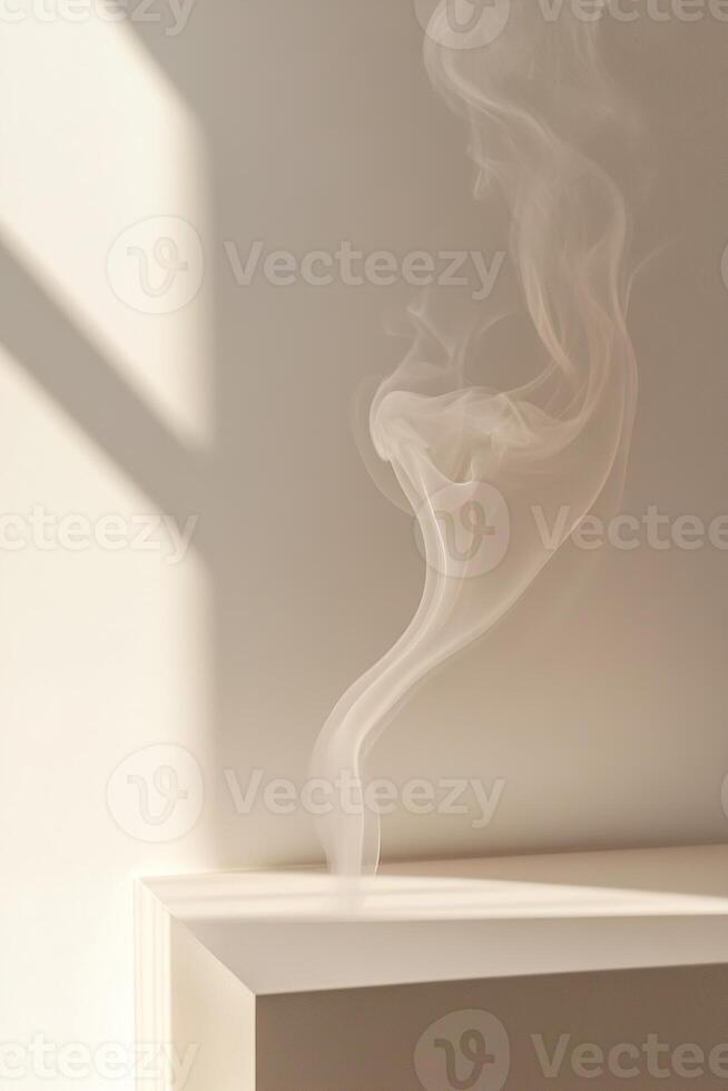 In a serene setting, gentle gray smoke spirals upward from a beige surface, creating a calm and sophisticated ambiance with modern aesthetics and ample space for text overlay photo