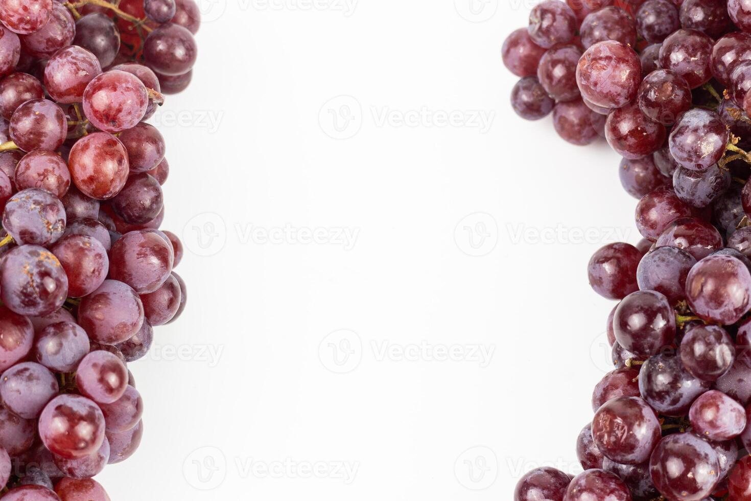 Red grape on white background. Top view. Flat lay. Copy space. photo