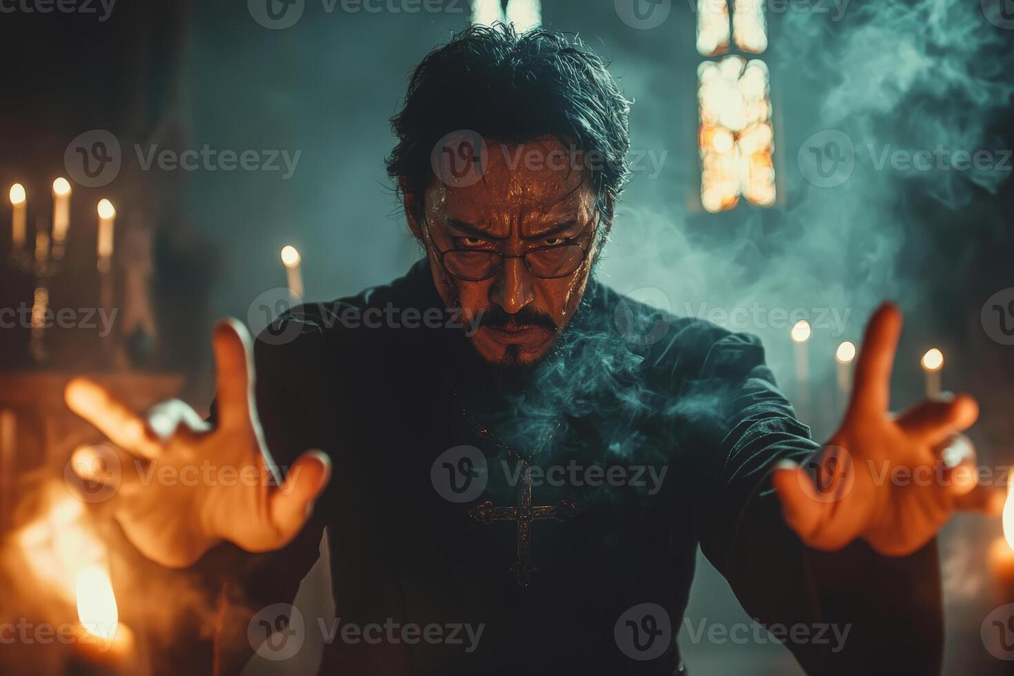 A man in a black robe with smoke coming out of his hands photo