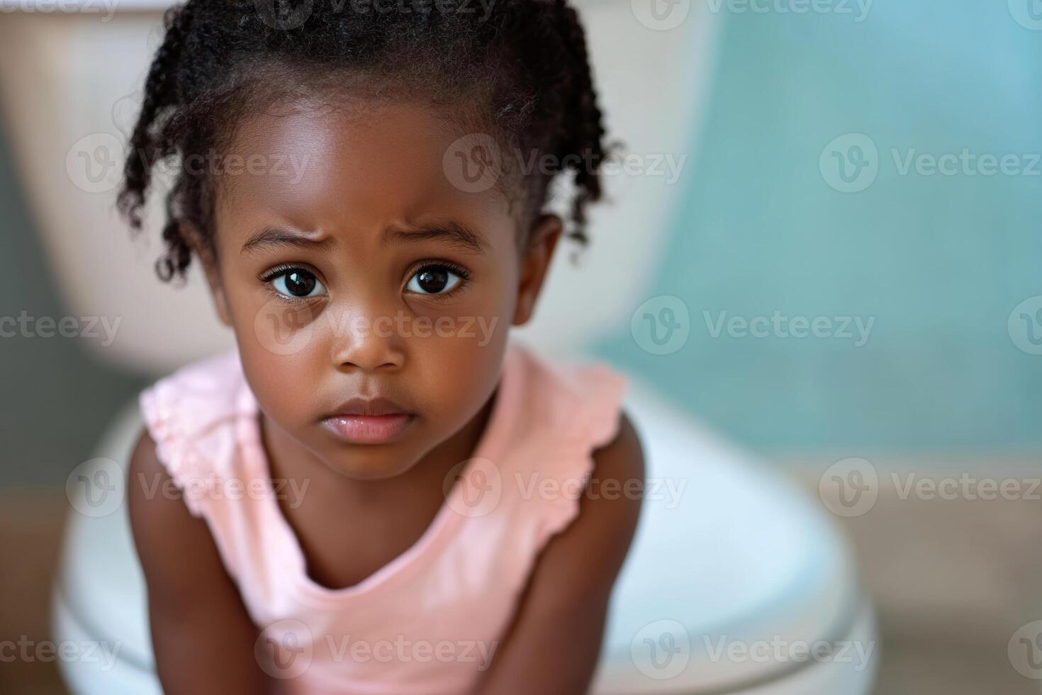Little girl on toilet A little girl sitting on a toilet 55094402 Stock Photo at Vecteezy