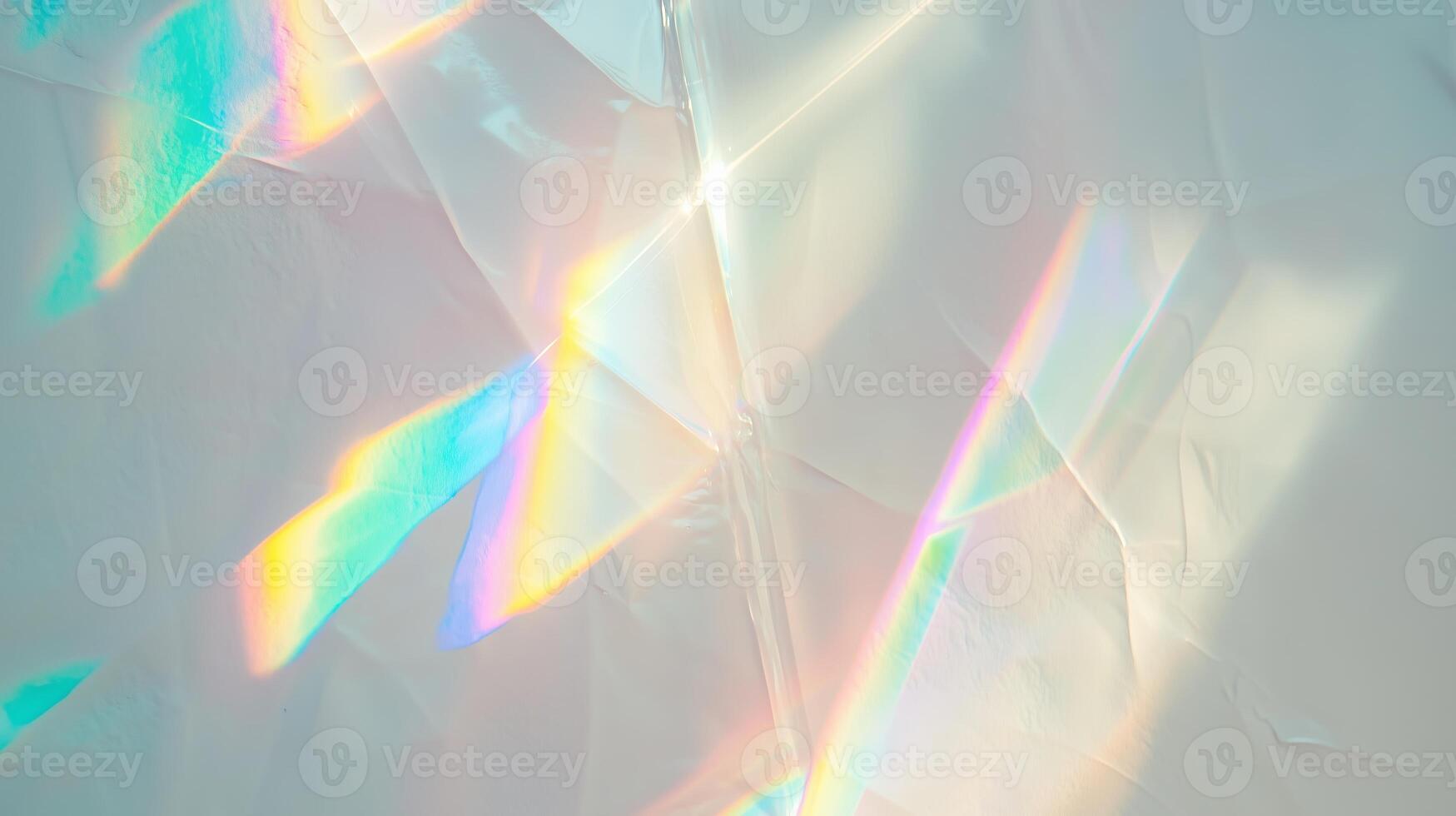 crystal prism rainbow light refraction texture on white wall photo