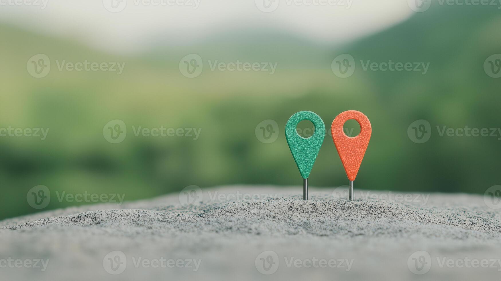 Colorful Geolocation Markers on Concrete Surface Against Blurred Green Landscape Background for Navigation and Location Concepts photo