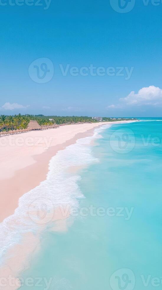 Aerial View of Pristine White Sand Beach with Turquoise Waves and Clear Blue Sky in Tropical Paradise for Travel Concept and Coastal Design photo