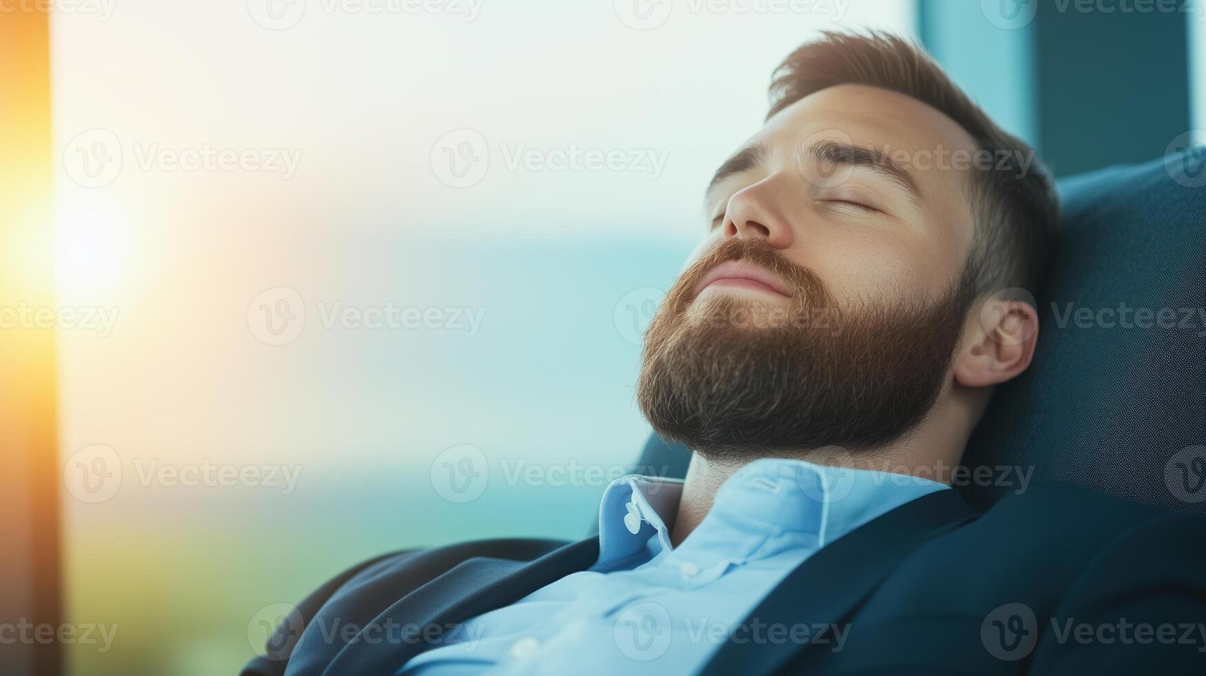 Businessman Relaxing in Lounge After Successful Day with Sunlit Backdrop and Comfortable Setting photo