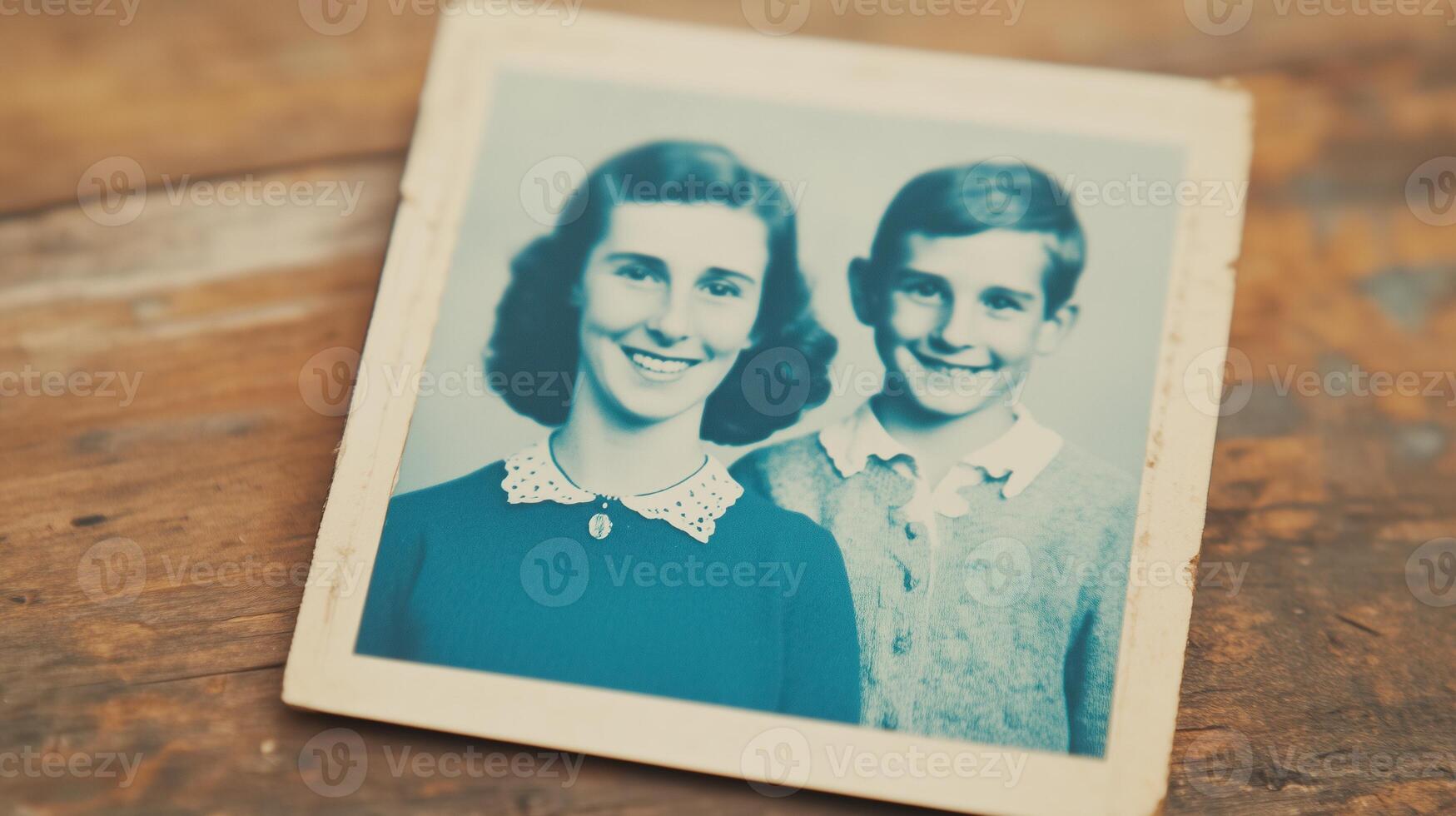 Vintage Family Portrait Photo of Smiling Siblings on Wooden Table, Nostalgic Retro 1950s Black and White Image with Sepia Tone Highlighting Classic Fashion and Warm Family Memories