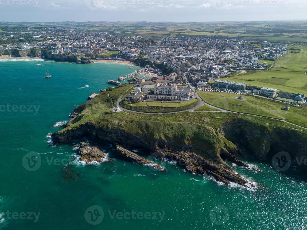 Aerial view of newquay, a cornish town overlooking the ocean on a sunny day photo