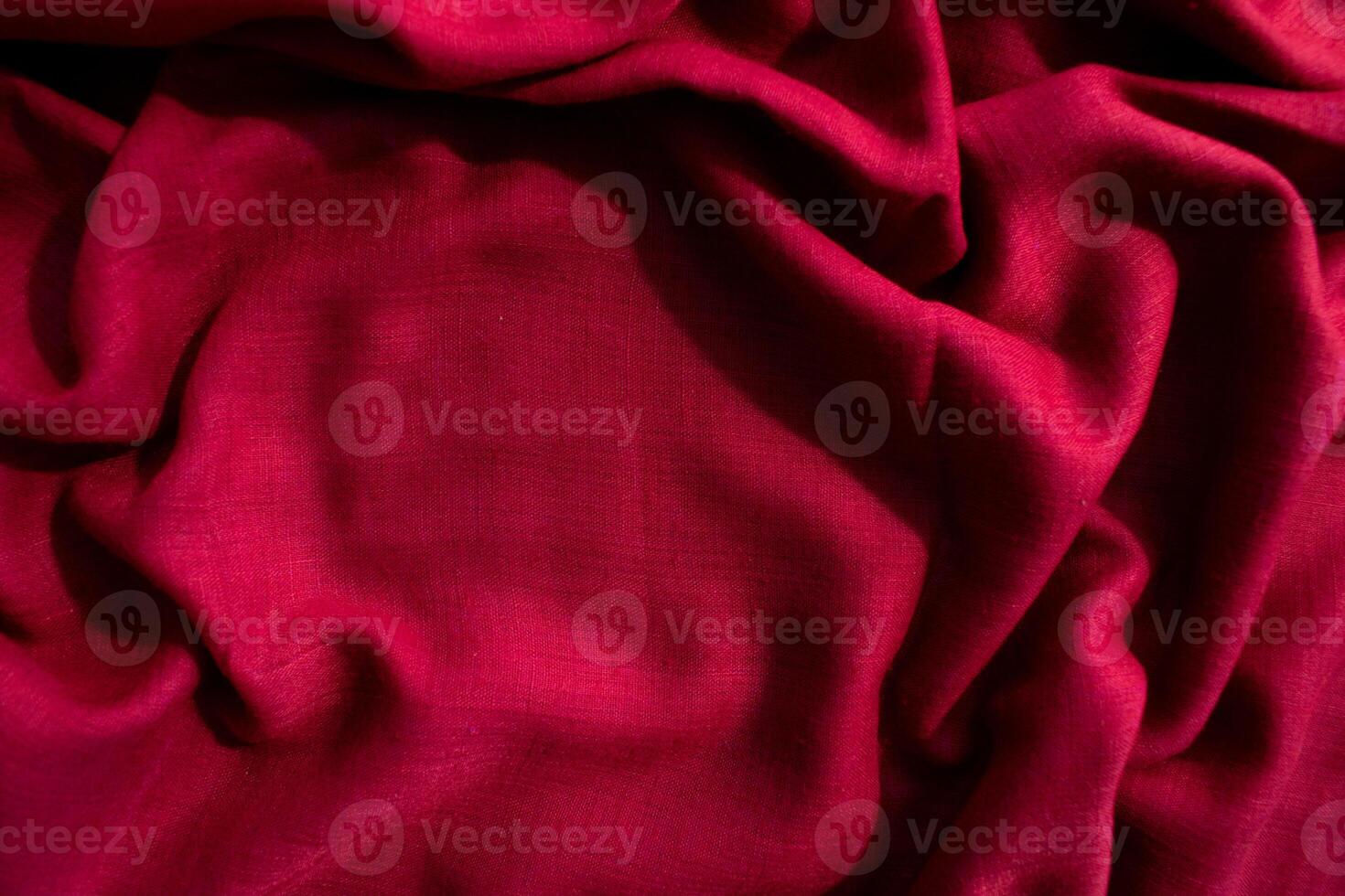 abstract background texture Red fabric wavy crumpled with copy space. photo