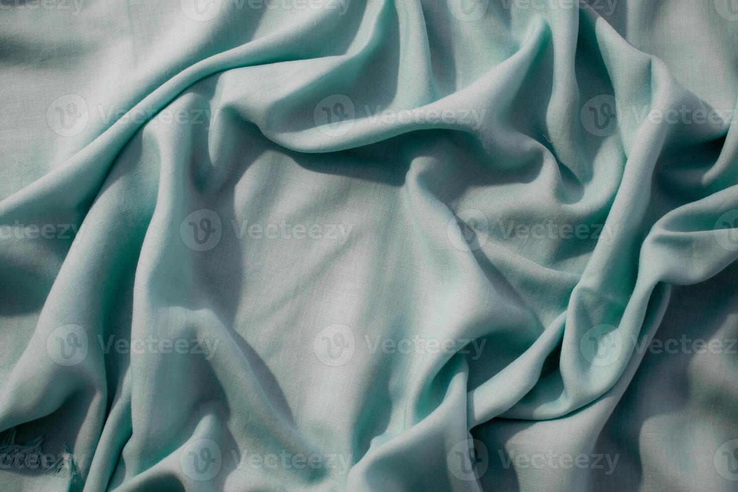 background texture Nude green fabric wavy crumpled with copy space. photo