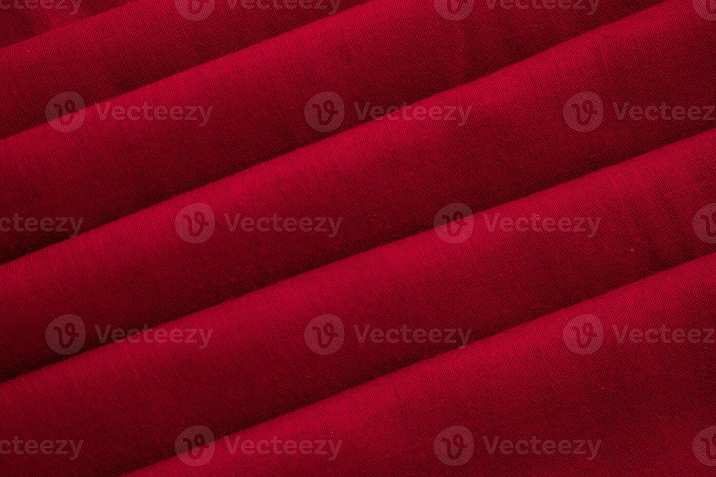 Close up Red folded Fabric abstract Background Texture. photo