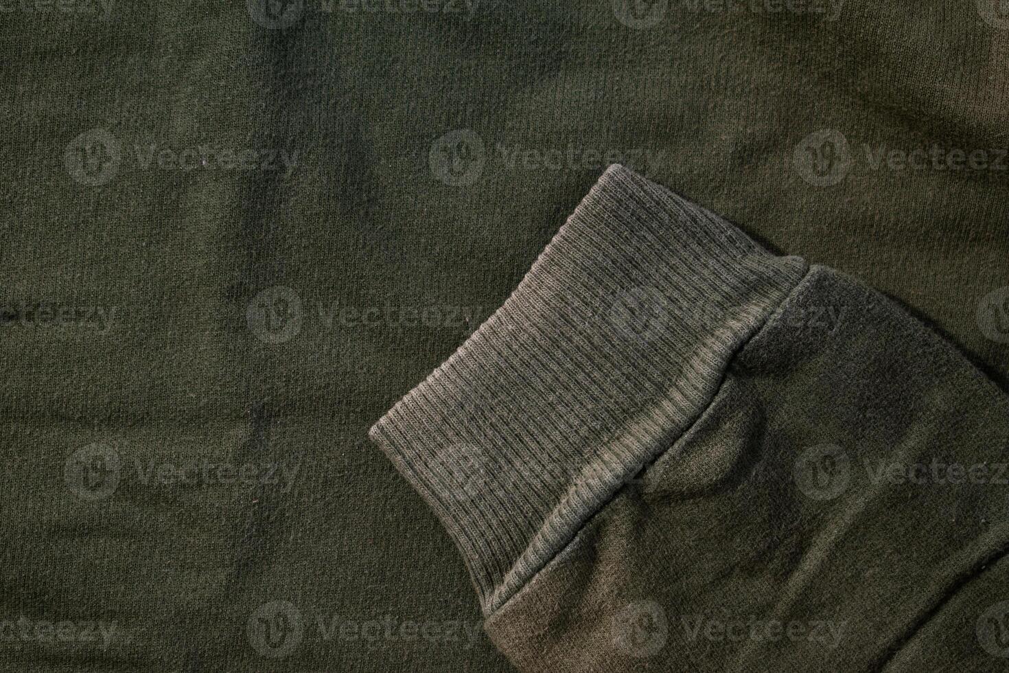 Handcuff Green army fabric background texture. photo