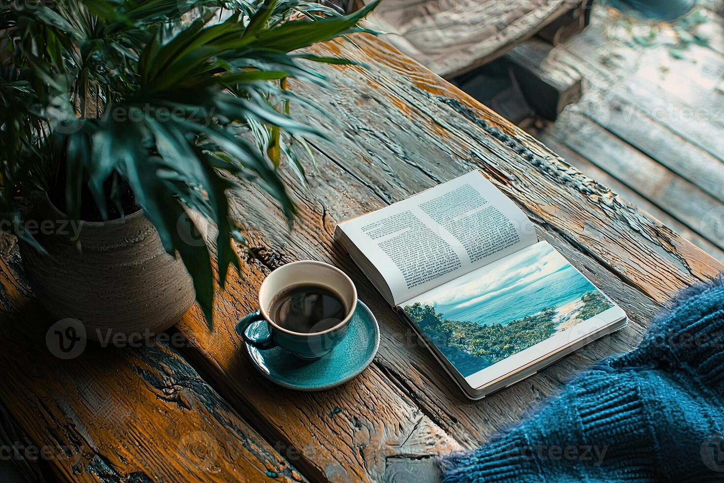 Cup of coffee and book on a wooden table. Selective focus photo