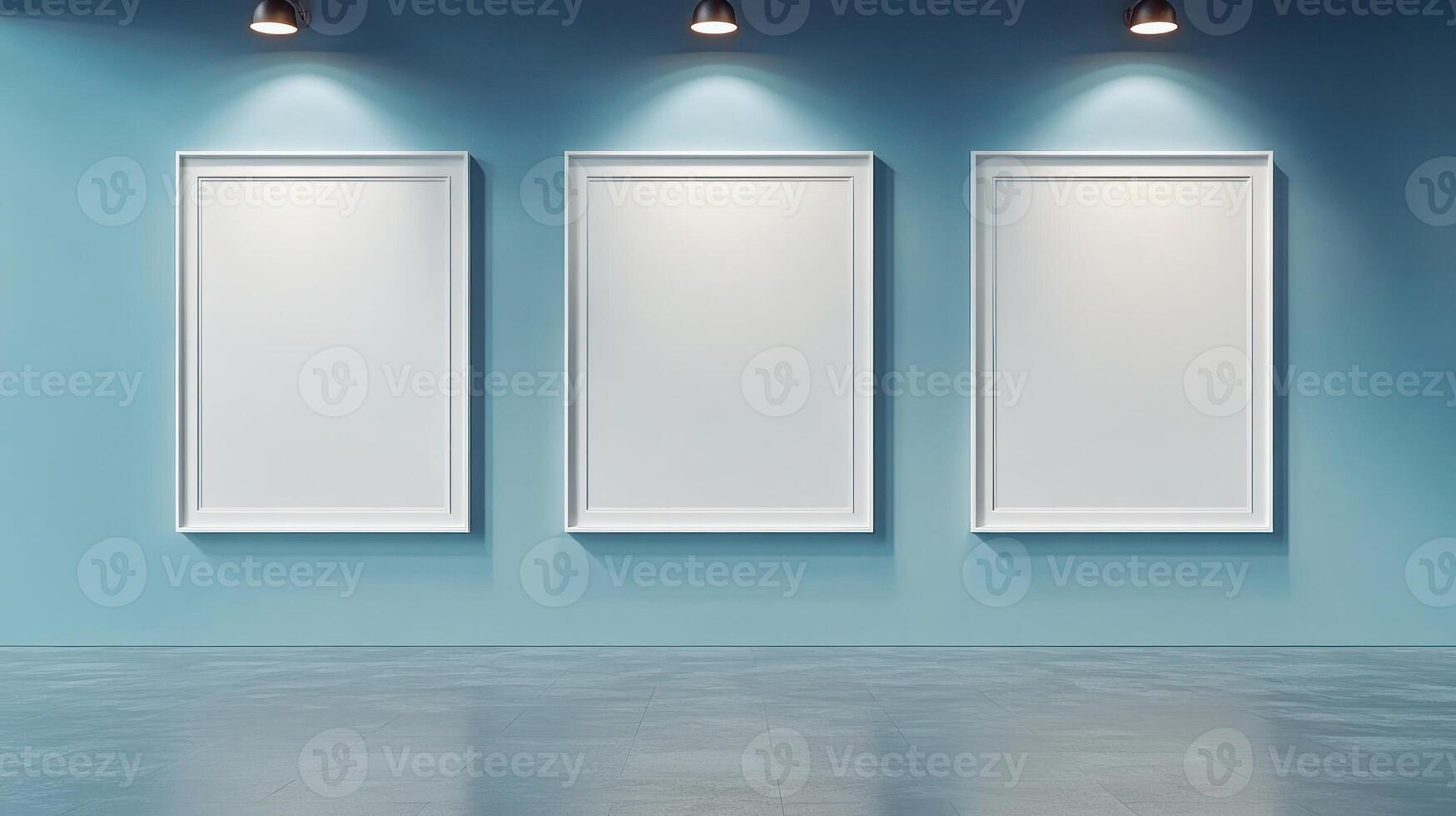 Three blank frames on a soothing blue wall create an artistic atmosphere photo