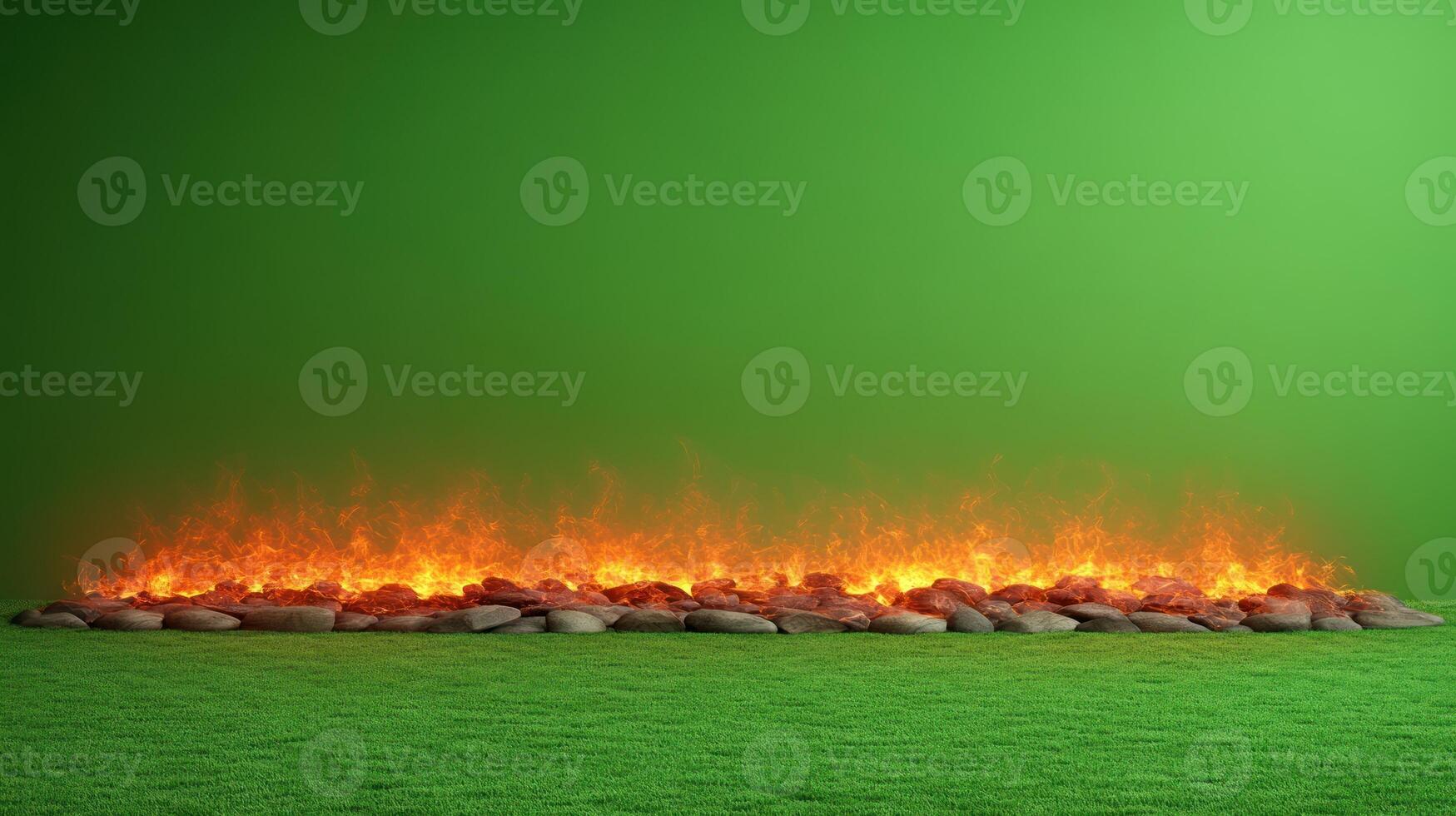 Flames flicker above smooth stones, contrasting with a deep green backdrop photo