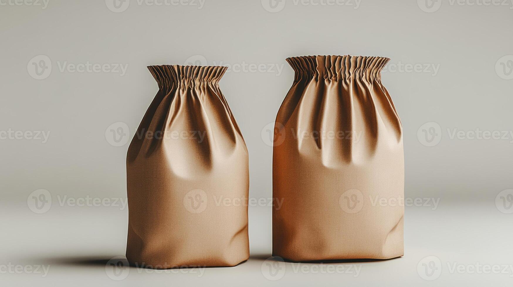 Two brown paper bags display a creative design on a clean surface photo