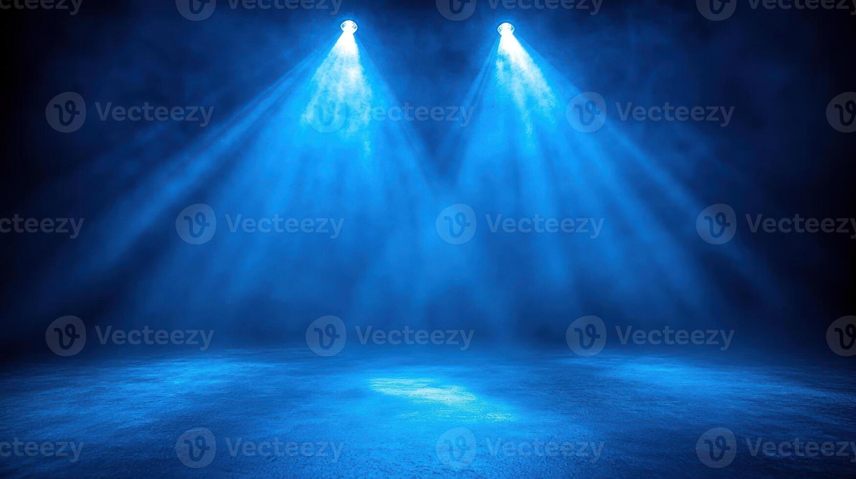 Blue beams of light pierce through a foggy stage, creating an enchanting ambiance photo