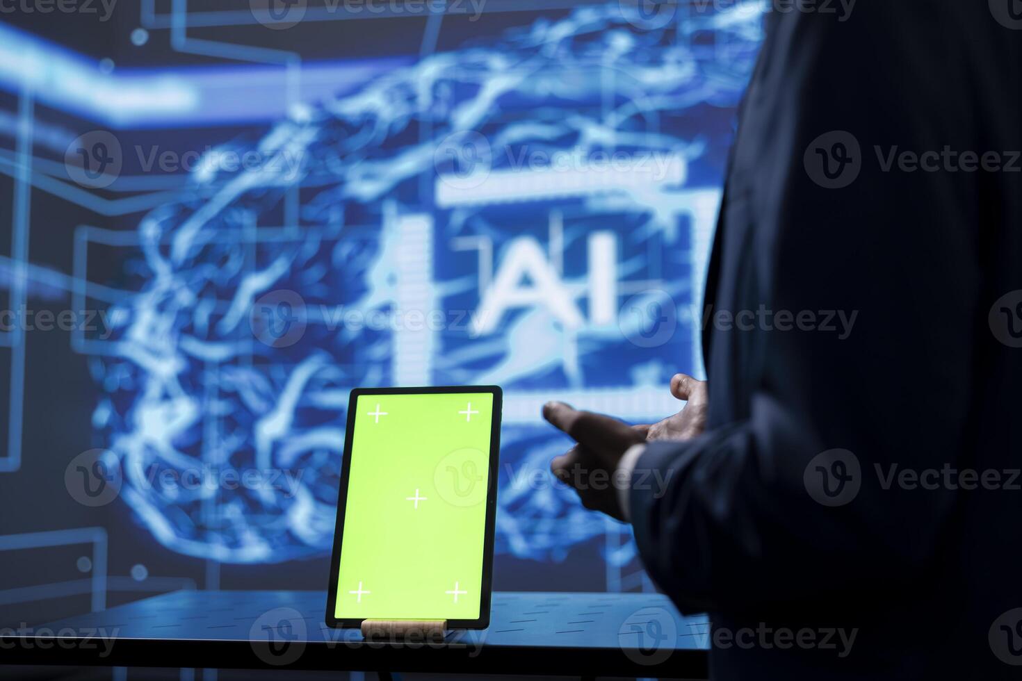 Developer analyzing complex AI brain models on green screen tablet. IT specialist using machine learning software on chroma key device to develop artificial intelligence technology photo
